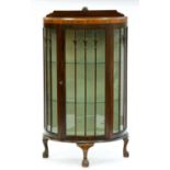 A bow fronted walnut china cabinet, c1920,  126cm h