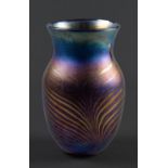 John Ditchfield for Glassform Ltd. Vase, iridescent glass with peacock feather trailed decoration,