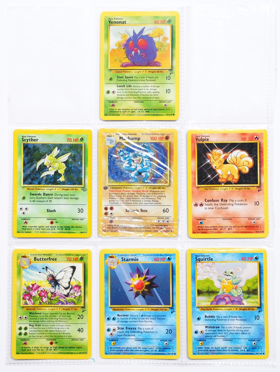 Seven Pokémon cards, including Machamp hologram, loosely-inserted in a collector's sleeve, [1]