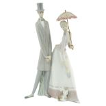 A Lladro group of a couple, 50cm h, printed mark Parasol slightly chipped