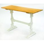 A Victorian cast iron table,  with rectangular wooden top, 78cm h; 47 x 122cm Good condition