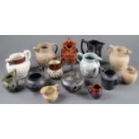 Eleven English felspathic stoneware and earthenware jugs, first half 19th c, with sprigged,