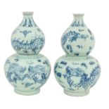 A pair of Chinese blue and white double gourd  dragon vases, 20th c, 38cm h Good condition save