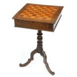 A walnut games table, mid 19th c, the hinged top on associated stained wood pillar and tripod,
