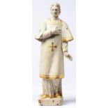 A white painted and giltwood figure of a saint, 19th c, 41cm h Paint slightly soiled, chipped and