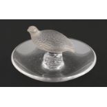 A Lalique clear and frosted glass ashtray in the form of a partridge, 97mm diam Minute chip to
