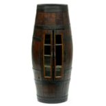 An oak barrel cabinet with iron coopered bands, pair of lead glazed doors with metal hinges, 106cm h