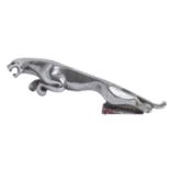 Vintage Motoring.  A Jaguar  chromium plated car mascot, mid 20th c,  19.5cm l, cast part number (