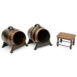 Two copper bound oak barrels adapted as coal scuttles and an oak stool, coal scuttles 46cm h