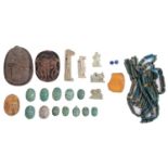 Antiquities. Twelve ancient Egyptian and later faience scarabs, various sizes, one of  yellow