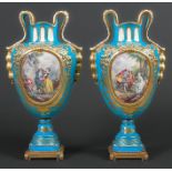 A pair of Sevres style vases, French, late 19th c, painted with scenes of 18th c courtship and, to