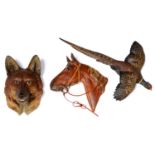 Three cold painted bronze wall plaques, second half 20th c, as the head of a fox, horse and