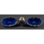 A Fieldings Crown Devon powder blue ground vase and pair of dishes, c1930, dish 25.5cm l, printed