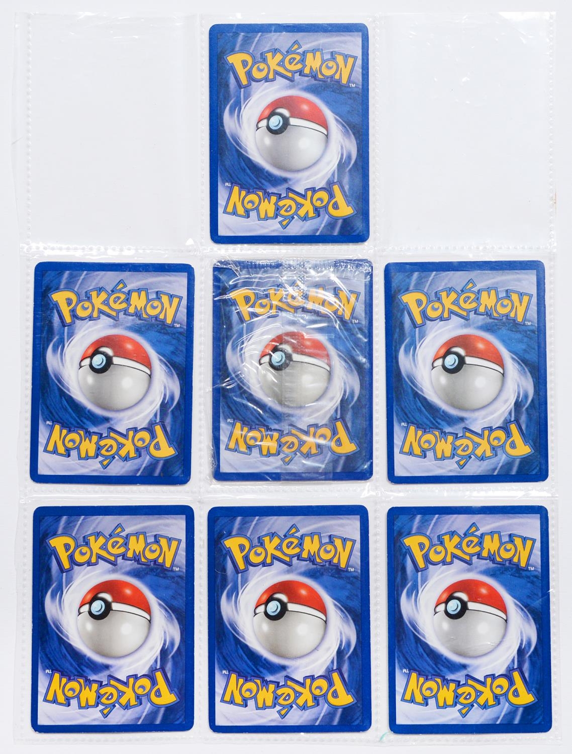 Seven Pokémon cards, including Machamp hologram, loosely-inserted in a collector's sleeve, [1] - Bild 2 aus 2