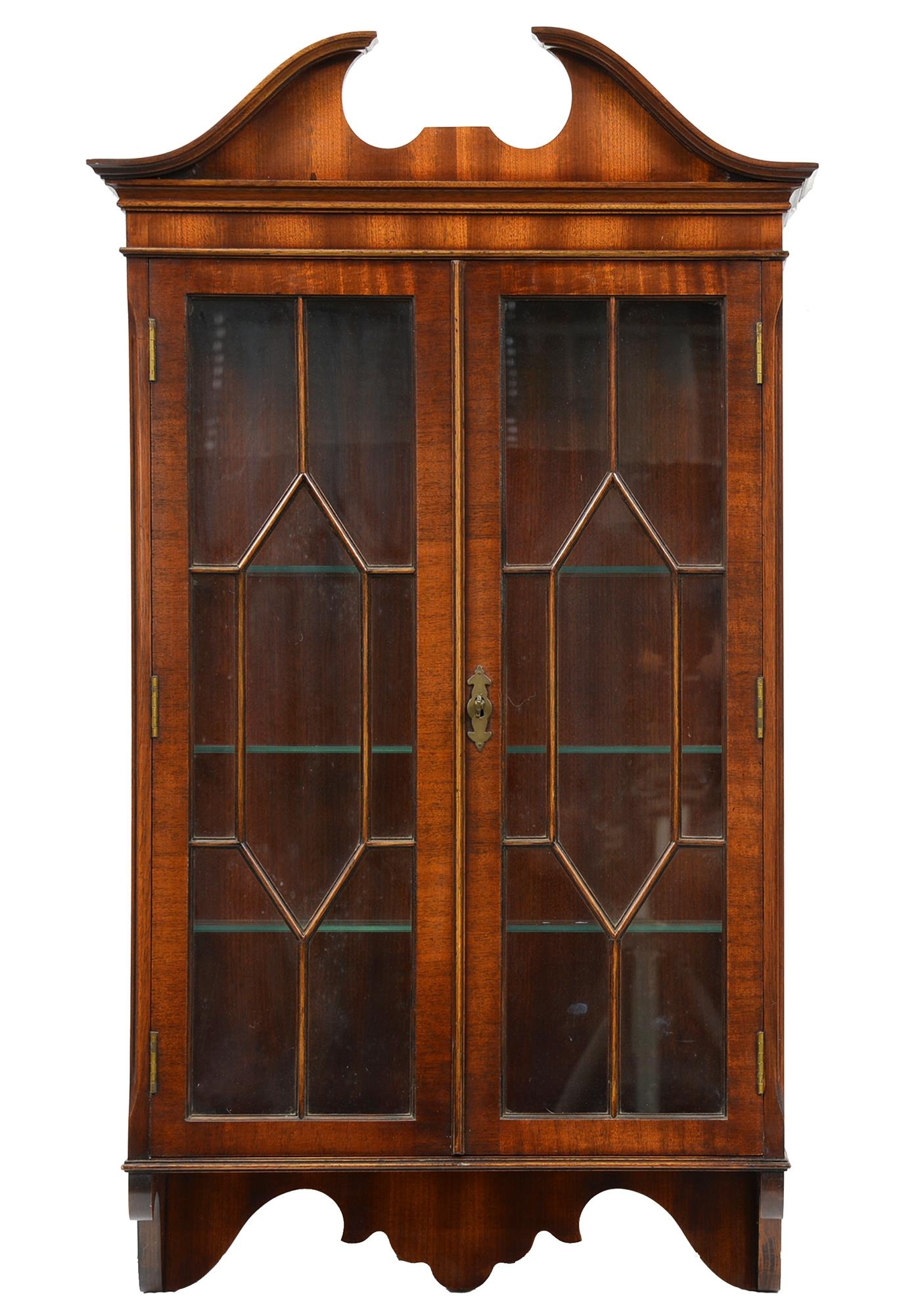 A mahogany hanging cabinet, with swan neck pediment, 106cm h; 20 x 61cm Good condition