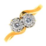 A diamond crossover ring, illusion set in 18ct gold, Sheffield 1992, 4.3g, size Q½ Good condition