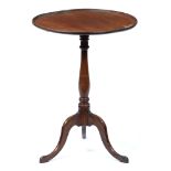 A mahogany tripod table, 19th / early 20th c, the dished top on ringed baluster pillar, 70cm h; 51cm