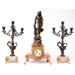 A French fin de siecle spelter figural and marble garniture de cheminee, the clock with primrose