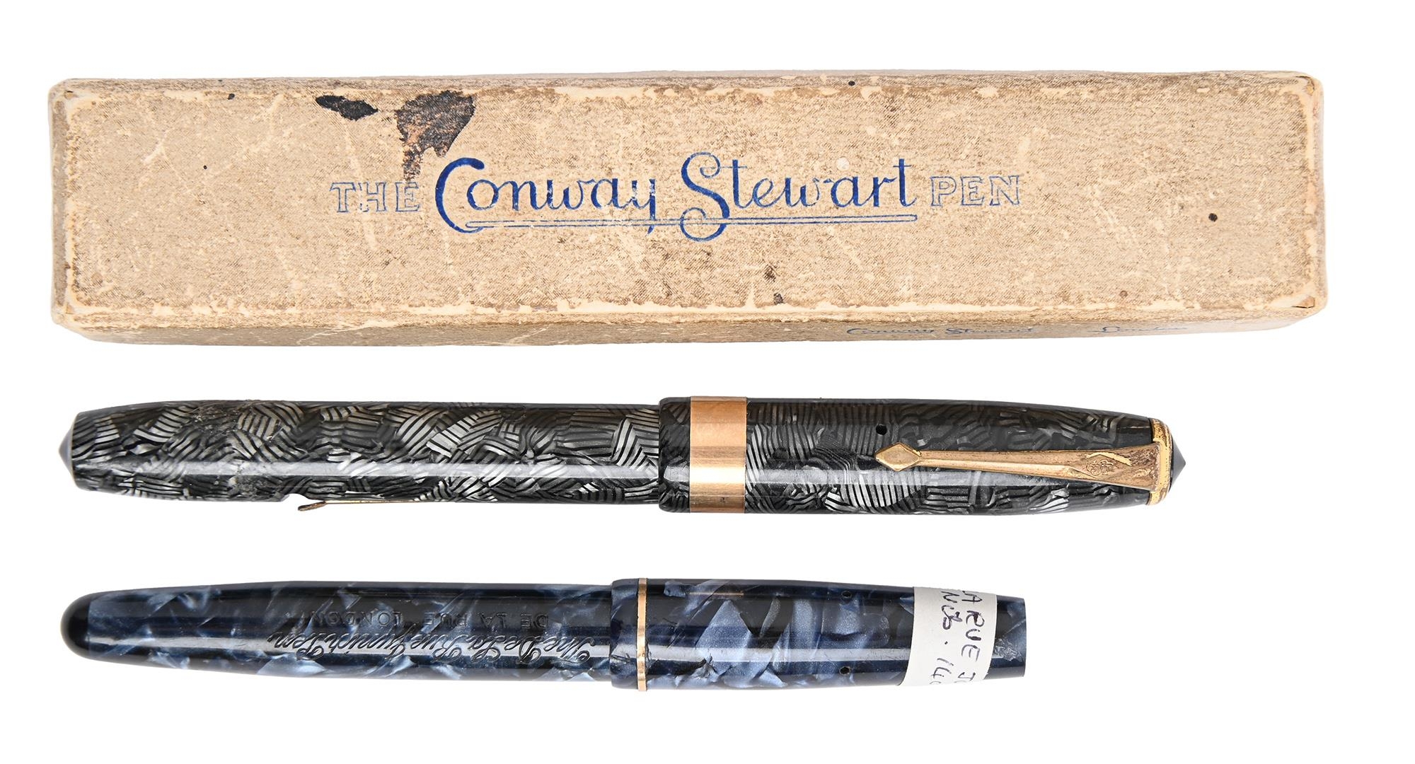 A Conway Stewart fountain pens, maker's gold nib marked 14k, leaflet guarantee and box and a similar