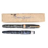 A Conway Stewart fountain pens, maker's gold nib marked 14k, leaflet guarantee and box and a similar