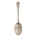 A William III silver trefid spoon, later chased, maker's mark, Britannia and lion's head erased only