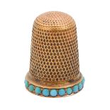 A turquoise set gold thimble, c1900,  20mm h,  inscribed 15ct, in the original fitted silk lined box