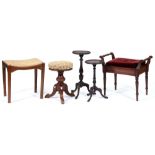 A Victorian music stool, two other stools and two graduated similar mahogany tripod tables Condition