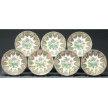 A set of seven  Spode white earthenware plates, c1820, printed in sepia and enamelled with a