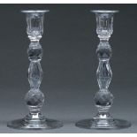 A pair of English cut glass candlesticks, early 20th c, with baluster stem and two faceted knops,