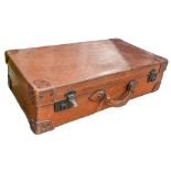 A leather suitcase, early 20th c, brass locks, 40 x 72cm Good quality and in fair condition for age