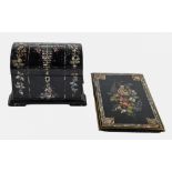 A Victorian papier mache tea chest and contemporary blotting book, inlaid in mother of pearl,