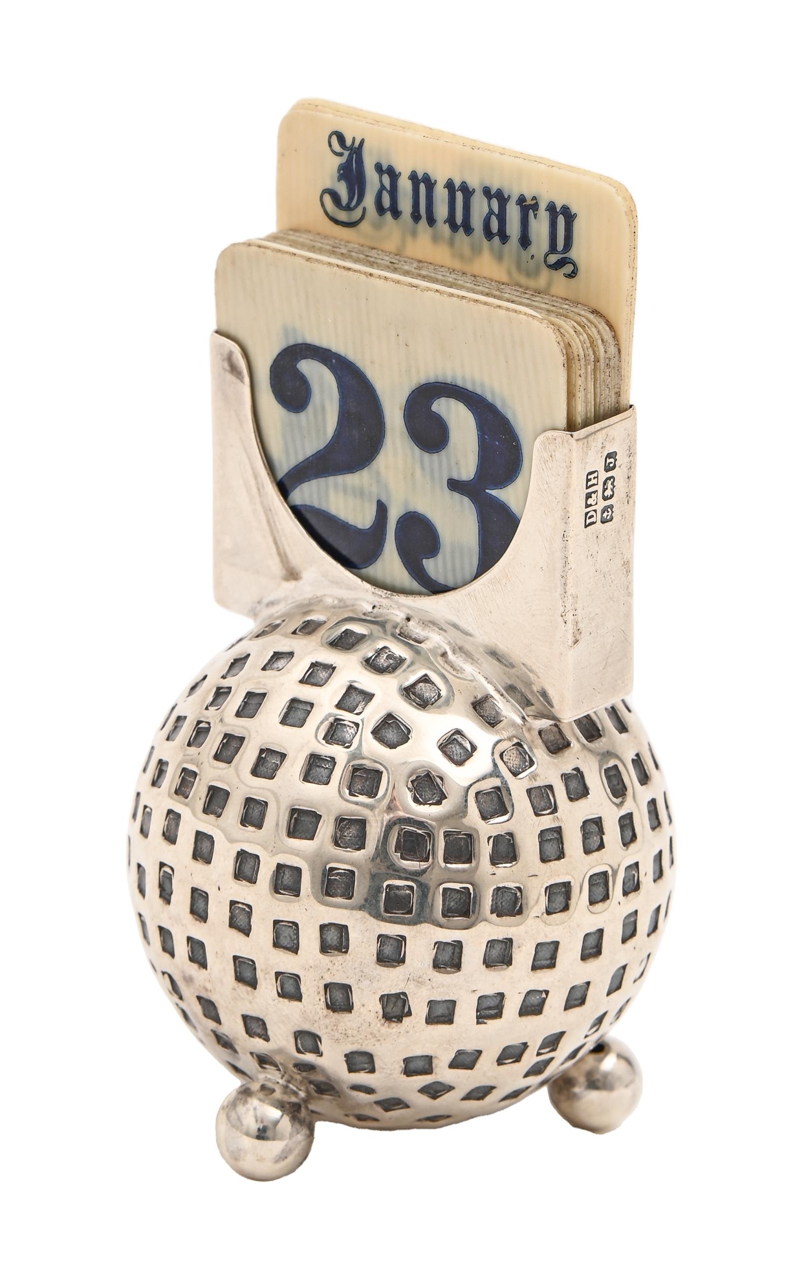 A George V silver golf ball novelty calendar, 80mm h, by Deykin & Harrison, Birmingham 1933, 1oz