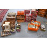 An extensive stock of screws, bolts and other hardware, sorted into tins, cabinets and boxes