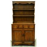 An oak dresser, with boarded rack, 178cm h; 44 x 95cm