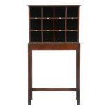 A mahogany twelve pigeon hole post room cabinet on stand, c1930, the back of plywood, 148cm h; 31