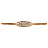 A diamond bar brooch, in gold, 61mm l, marked 585, 4.6g Good condition