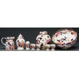 A Mason's Ironstone Mandalay pattern bowl, jug, two jars and covers, four egg cups and a pepper pot,