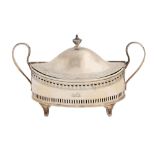 An Irish George III pierced and engraved silver dish and cover, of navette shape with loop handles