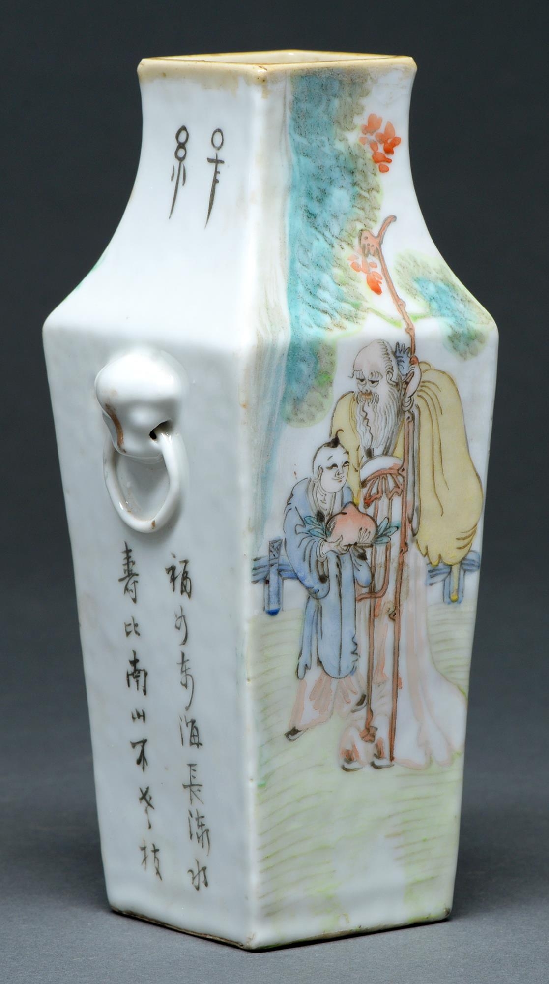 A Chinese porcelain vase, c late 19th c,  of square section with ring handles, painted with