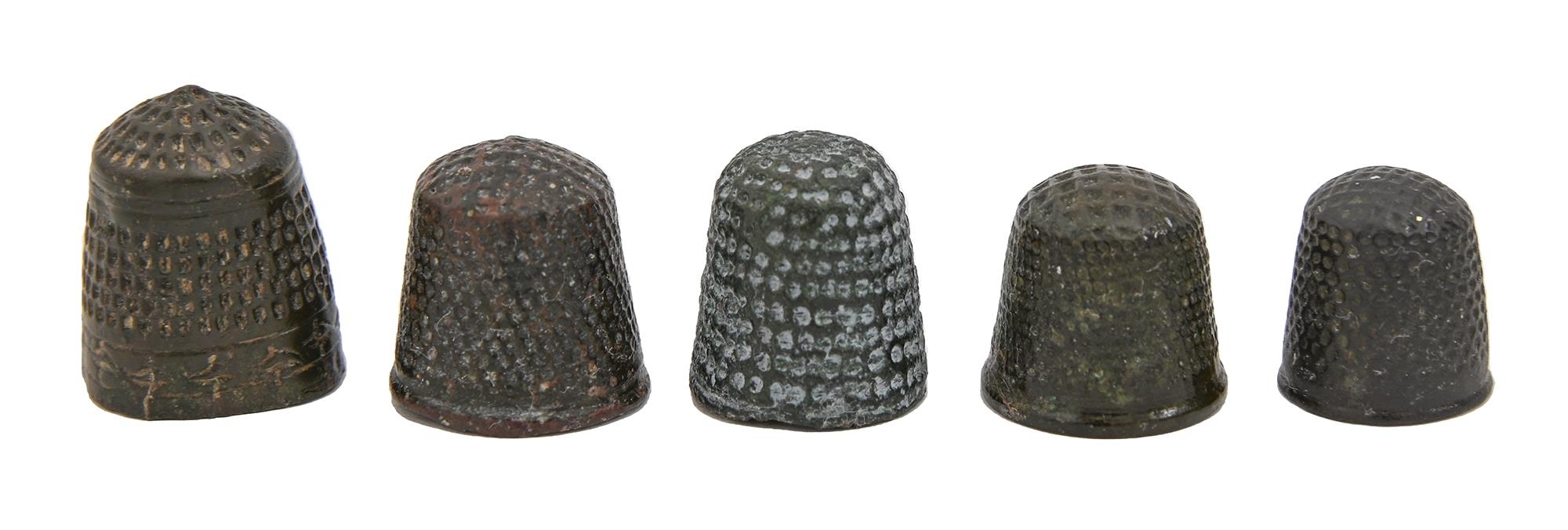 Five brass miniature thimbles, 17th c and earlier, 18mm h and smaller Good condition