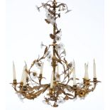 A Venetian naturalistic brass chandelier, first half 20th c, of twelve lights with moulded white and