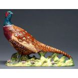 A Beswick pheasant, 19cm h, impressed title and 1225, printed mark Good condition
