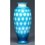 A Chinese glass vase, 20th c, the creamy opal glass cased in blue and cut with hexagons, 28.5cm h