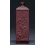 A rare Elers Brothers red stoneware tea canister, 1690-98, slip cast and moulded in relief in the