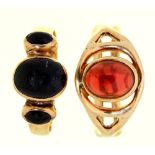 Two garnet rings,  in 9ct gold, London 1977, 6.8g, sizes J and M Single stone ring in good