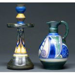 A Gouda art pottery candlestick and ewer, first half 20th c, 21 and 28cm h, incised numbers, painted