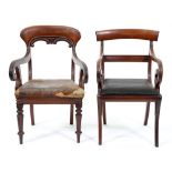 Two Victorian mahogany elbow chairs, on sabre or turned legs, seat height 46cm Worm damage to