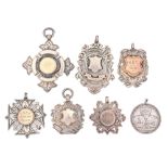 Seven Edwardian and George V silver prize watch fob shields, 2ozs 6dwts All but one in good