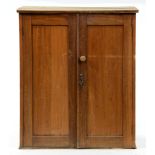 A pine two door cupboard, 110cm h; 48 x 92cm Shrinkage crack to top