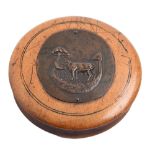 A Victorian turned sycamore snuff box and cover,  applied with a copper medallion stamped with a cow